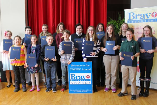 Group photo of students accepting awards