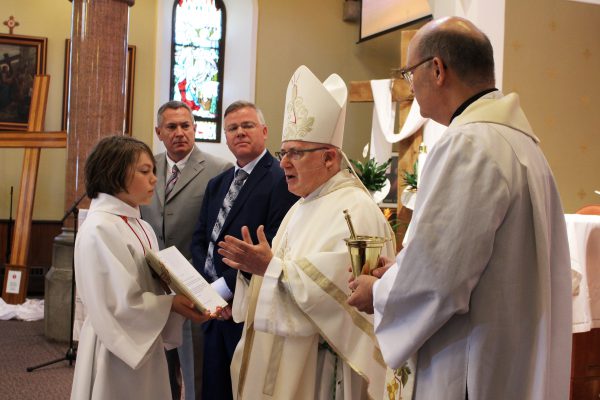 Priest speaking in a church 