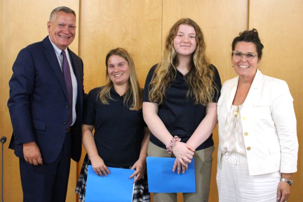 CDSBEO Board Chair Todd Lalonde, Ella Scott, Chloe Finner, and CDSBEO Director of Education Laurie Corrigan