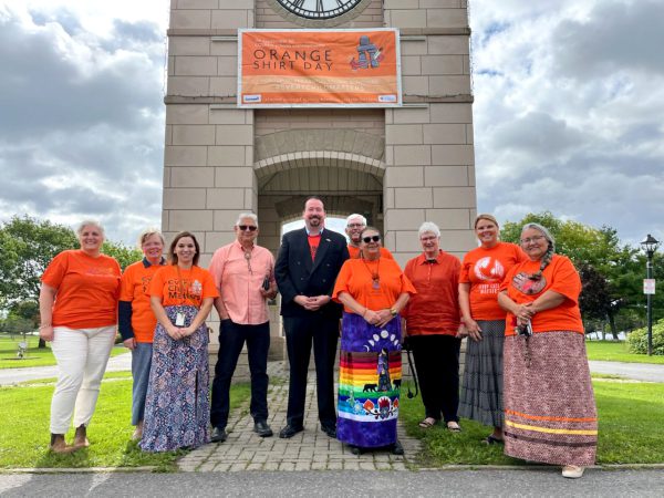 Orange Shirt Day Banner at the Clock Tower in Lamoureux Park, Cornwall.