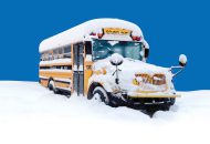 School bus stuck in snow.