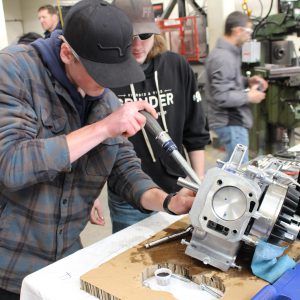 Students competing in the small engine repair portion of the Eastern Ontario SKLZ competition.