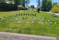 Students spelling out the word "Change" on the yard at St. Edward Catholic School.