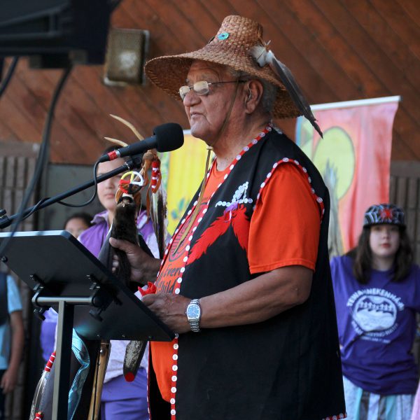 Elder Terry McKay from Tsimshian First Nation, BC gifting the seven eagle feathers for the Eagle staff.