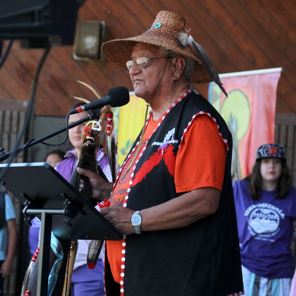 Elder Terry McKay from Tsimshian First Nation, BC gifting the seven eagle feathers for the Eagle staff. 