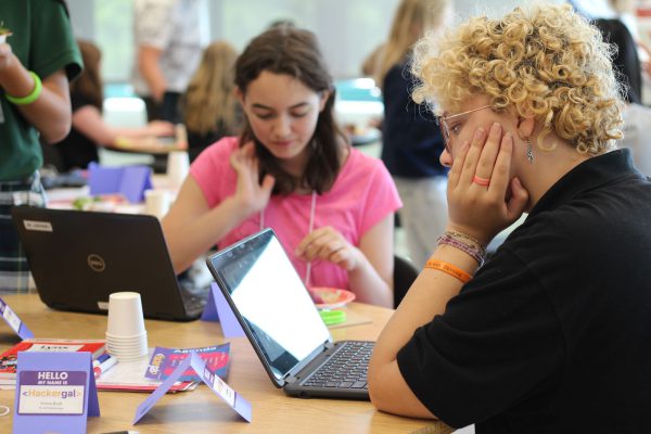 Girls coding as part of Hackergal Hackathon.