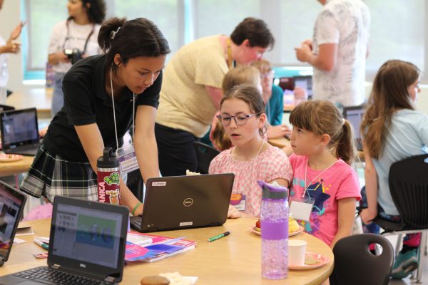 Girls coding as part of Hackergal Hackathon.