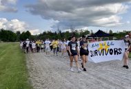 Students walking the track at the St. John CHS Relay for Life.