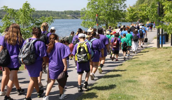 Students and community members walking in the Tewahnekenhá:wi (We Are Carrying Water) Walk.