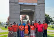 Representatives from the CDSBEO, Ahkwesahsne Mohawk Board of Education, Upper Canada District School Board, Mohawk Council of Akwesasne, and the City of Cornwall under the National Day of Truth and Reconciliation Banner in Cornwall.