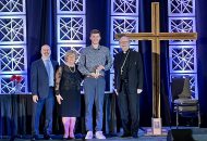 Student Riley O'Brien receives the Fr. Fogarty Award.